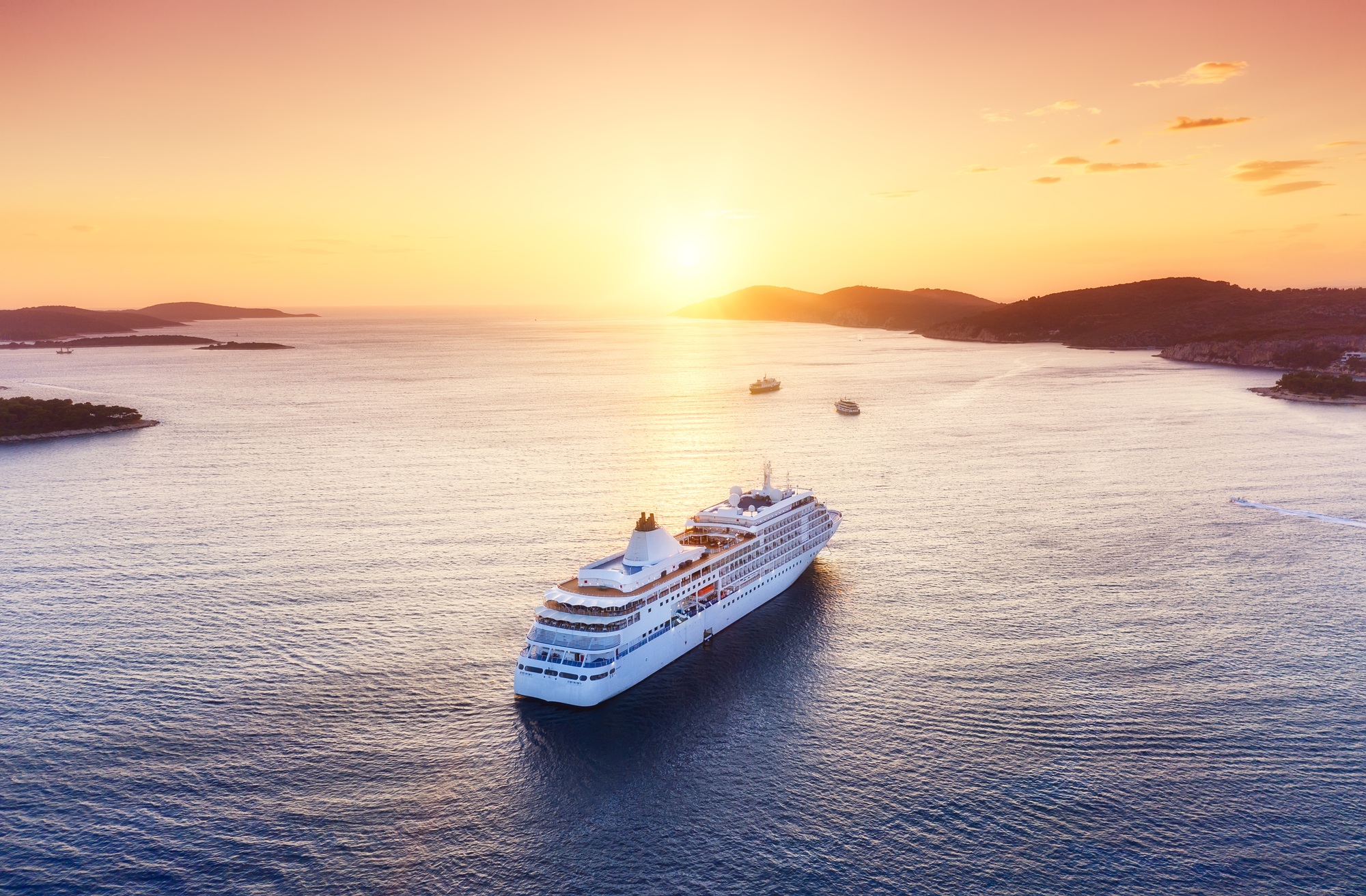Luxury cruise ship at sunset
